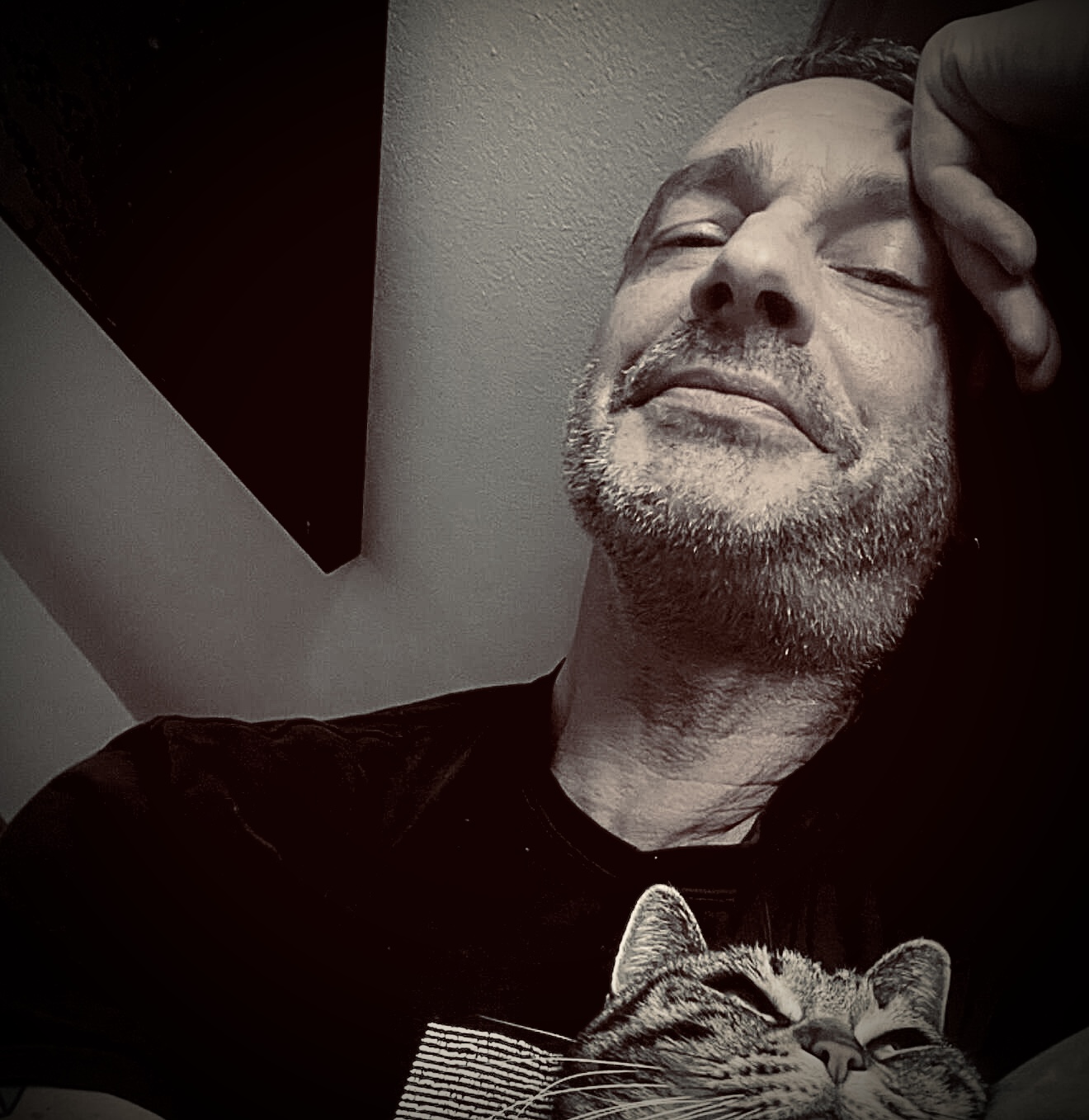Guido Bertoli with Kelly, his cat